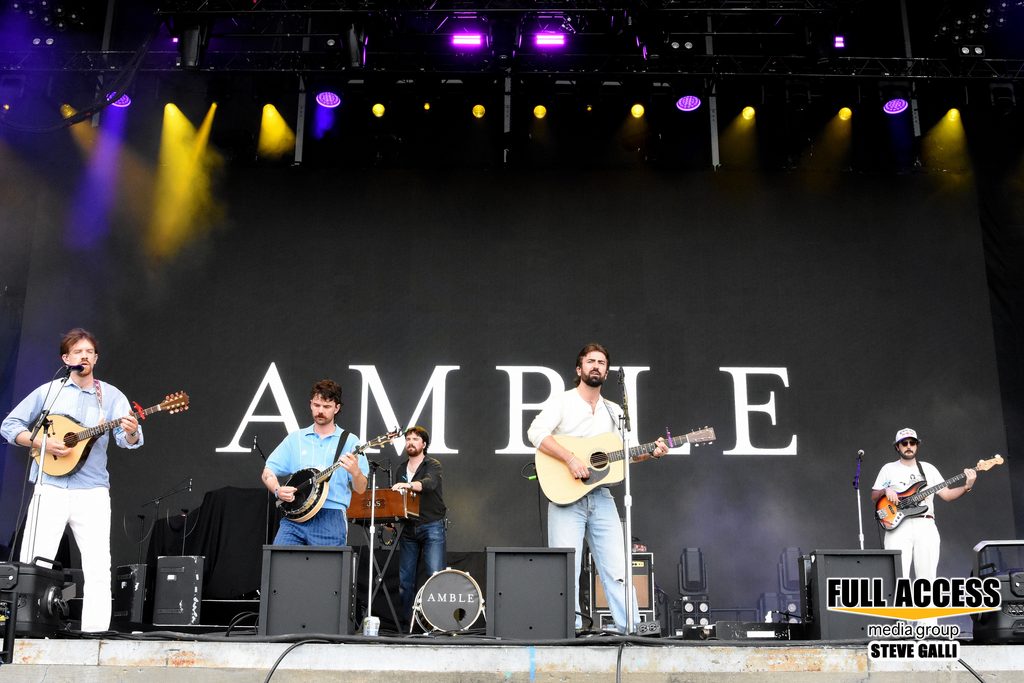 Amble performing with acoustic string instruments at Bonnaroo
