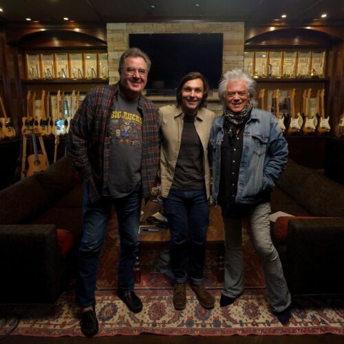 Musicians standing together in a recording studio for Vince Gill’s Marty And Me project.
